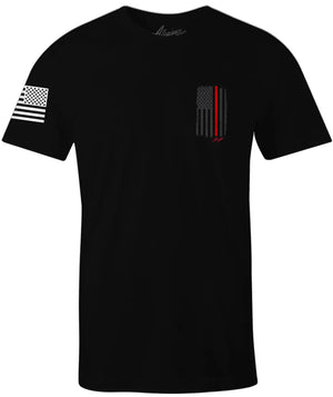 Front of Back the Red Back Hit Tee in black featuring small Thin Red Line flag graphic on the left chest and American flag on the sleeve.