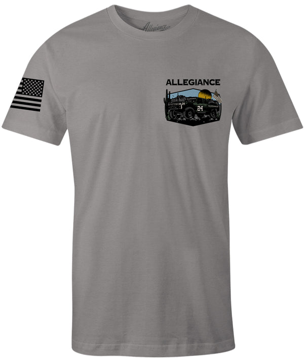 Front of Baja Premium Tee in gray featuring small desert off-road truck graphic with American flag and Allegiance logo on the chest.