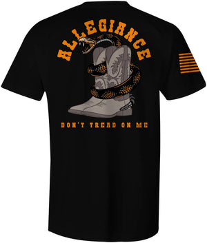 Back of Western Tee in black showing large rattlesnake wrapped around cowboy boots with “Allegiance” and “Don’t Tread On Me”