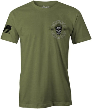 Front of Beret Premium Tee in OD Green with small chest graphic and American flag sleeve print