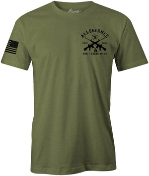Front of Don't Tread Premium Tee in OD Green with small chest graphic and American flag sleeve print