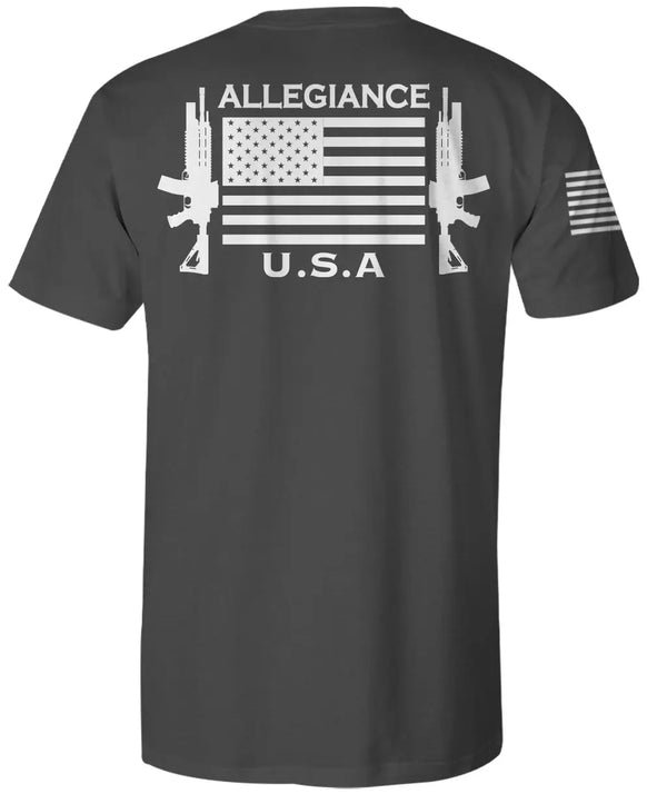 Back of Gunner Flag Premium Tee showcasing large white American flag with two rifles and bold “Allegiance U.S.A” graphic