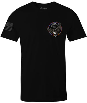 Front of Navigator Tee in black with small chest graphic and American flag sleeve print