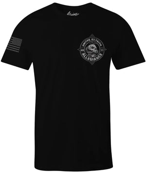 Front of Serpent Tee in black featuring small serpent and skull chest graphic and American flag on the sleeve.
